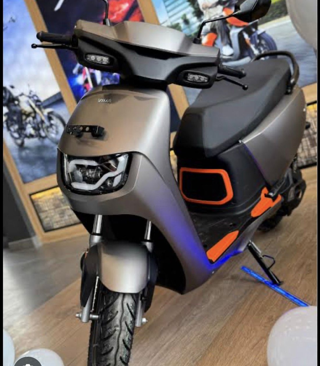 Electric scooter on display at a dealership showroom in India, 2026